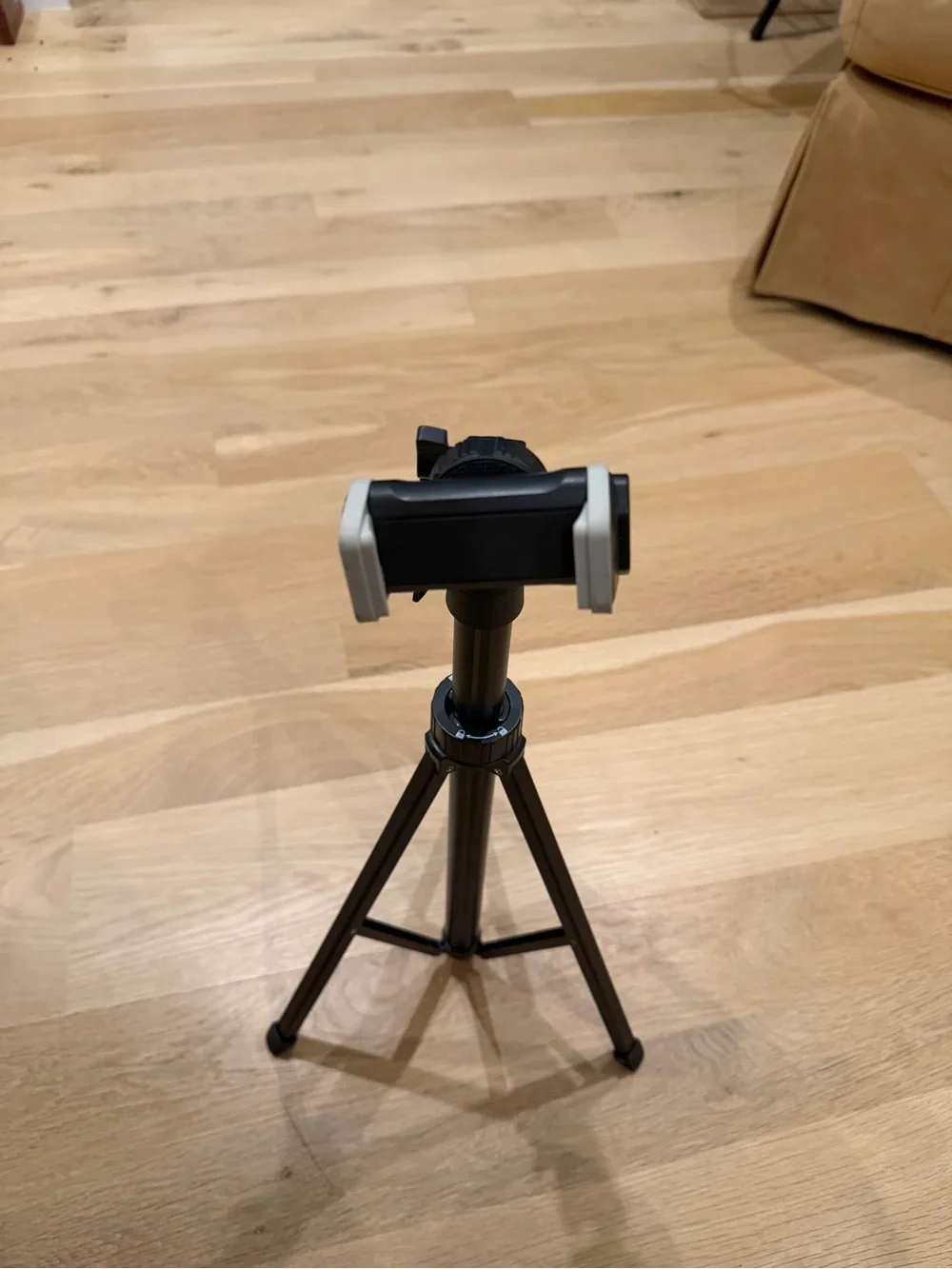 Compact Black Smartphone Tripod with Adjustable Phone Mount